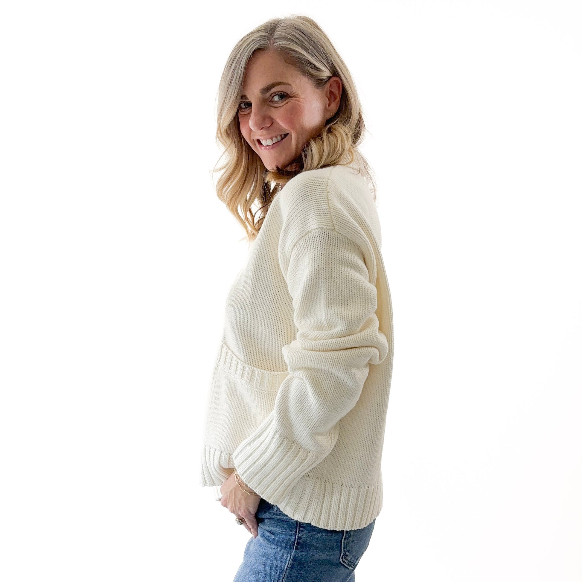 Ivory collared front pocket sweater with rib trim