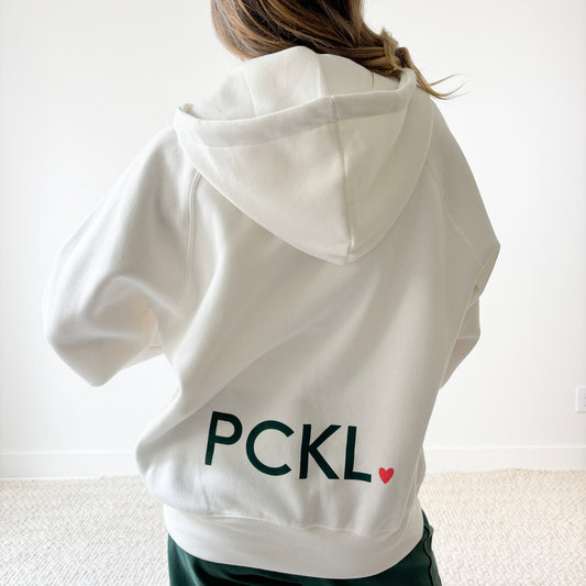 Women's ivory full zip hooded sweatshirt with pckl heart pickleball print on back