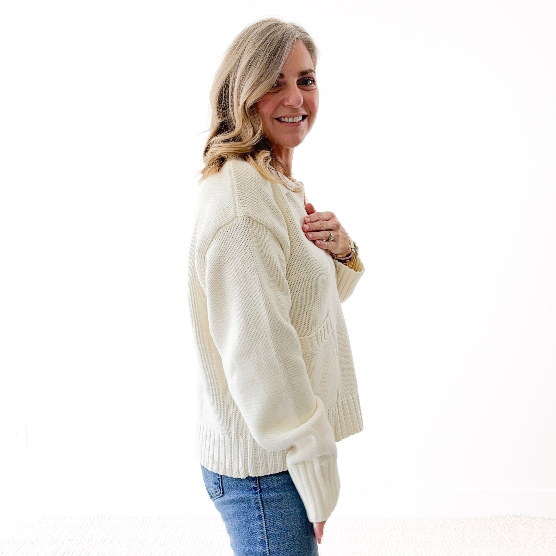 Ivory collared front pocket sweater with rib trim