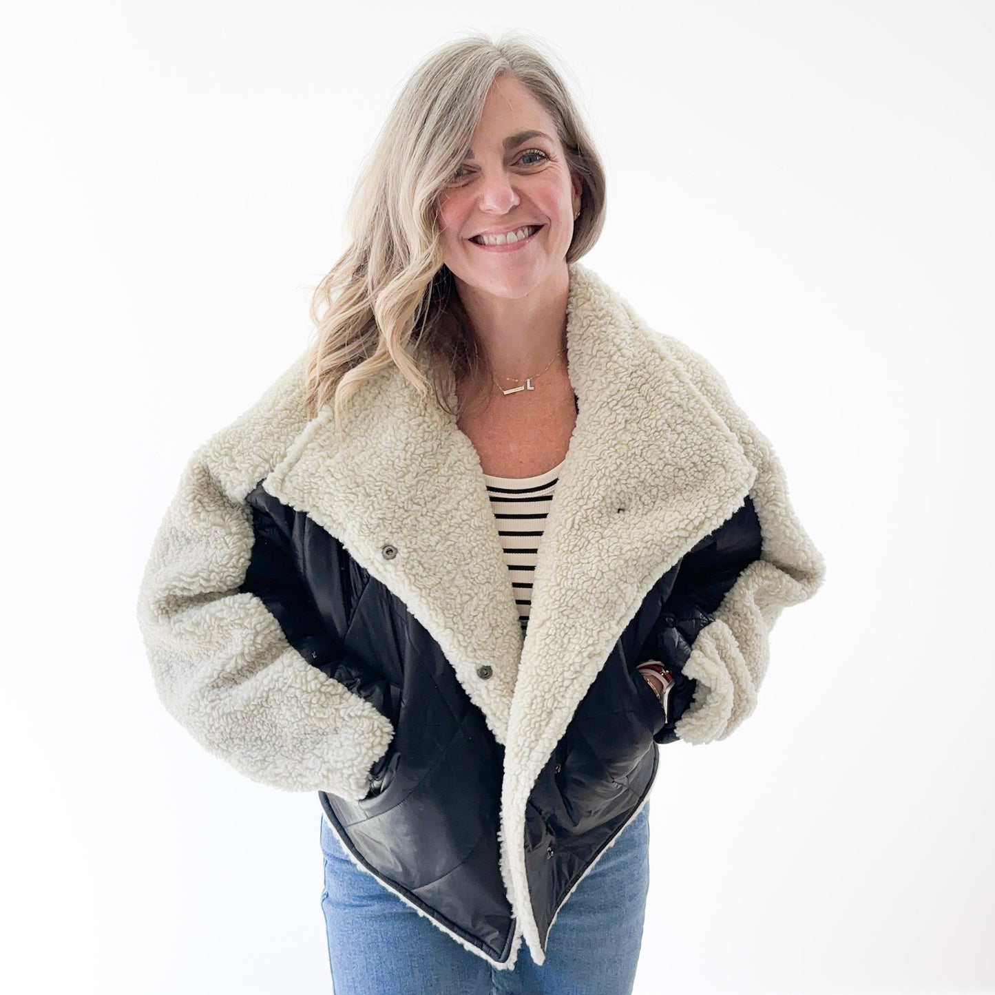 Women's ivory sherpa with black nylon bomber jacket