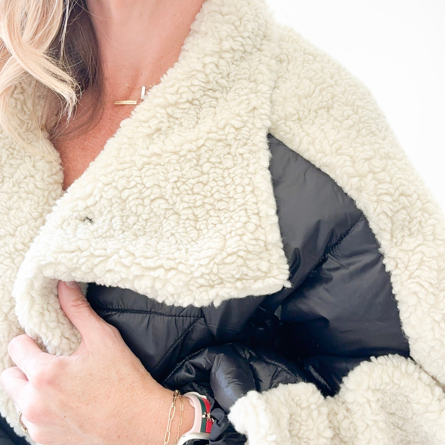 Women's ivory sherpa with black nylon bomber jacket