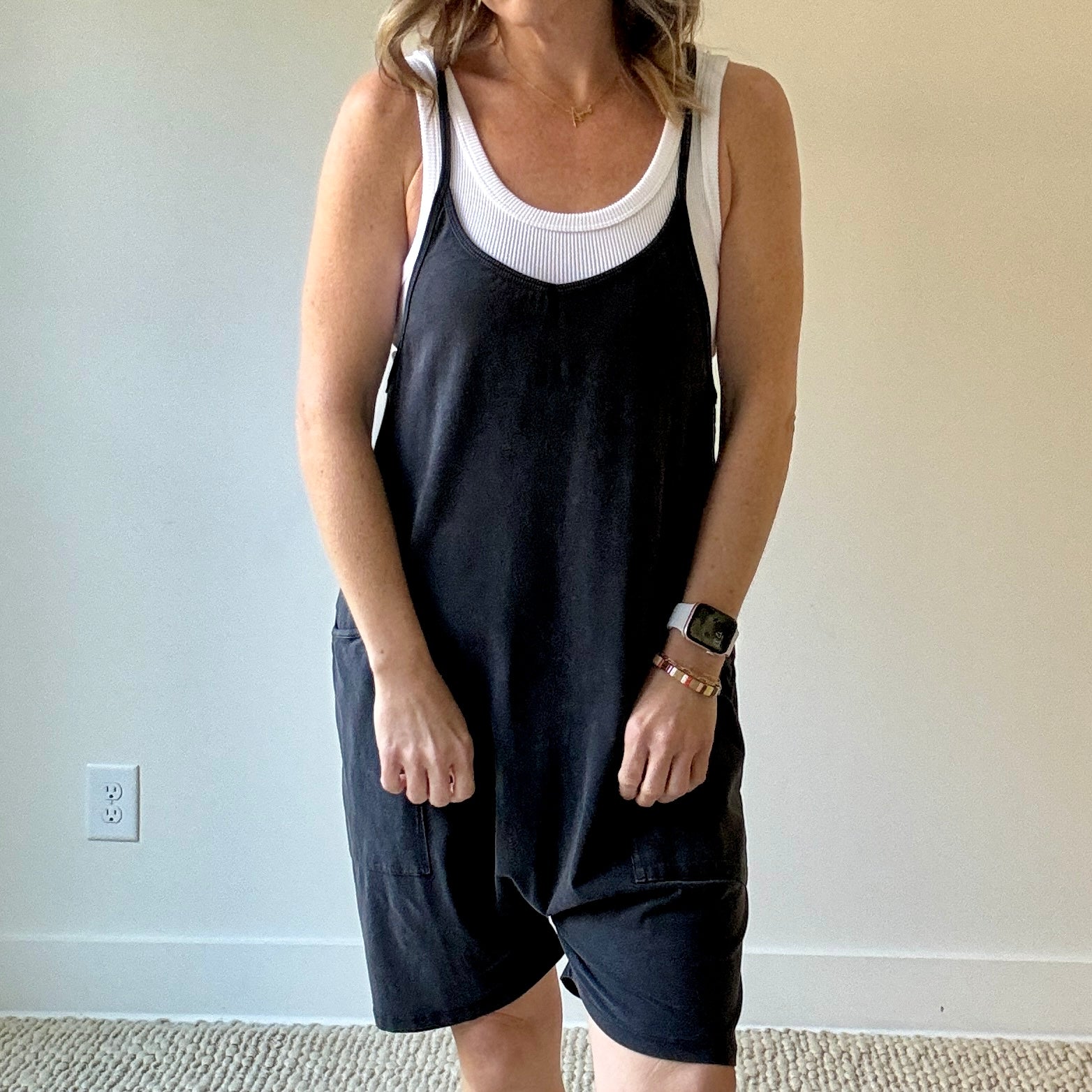 Women's washed black easy knit short romper with pockets