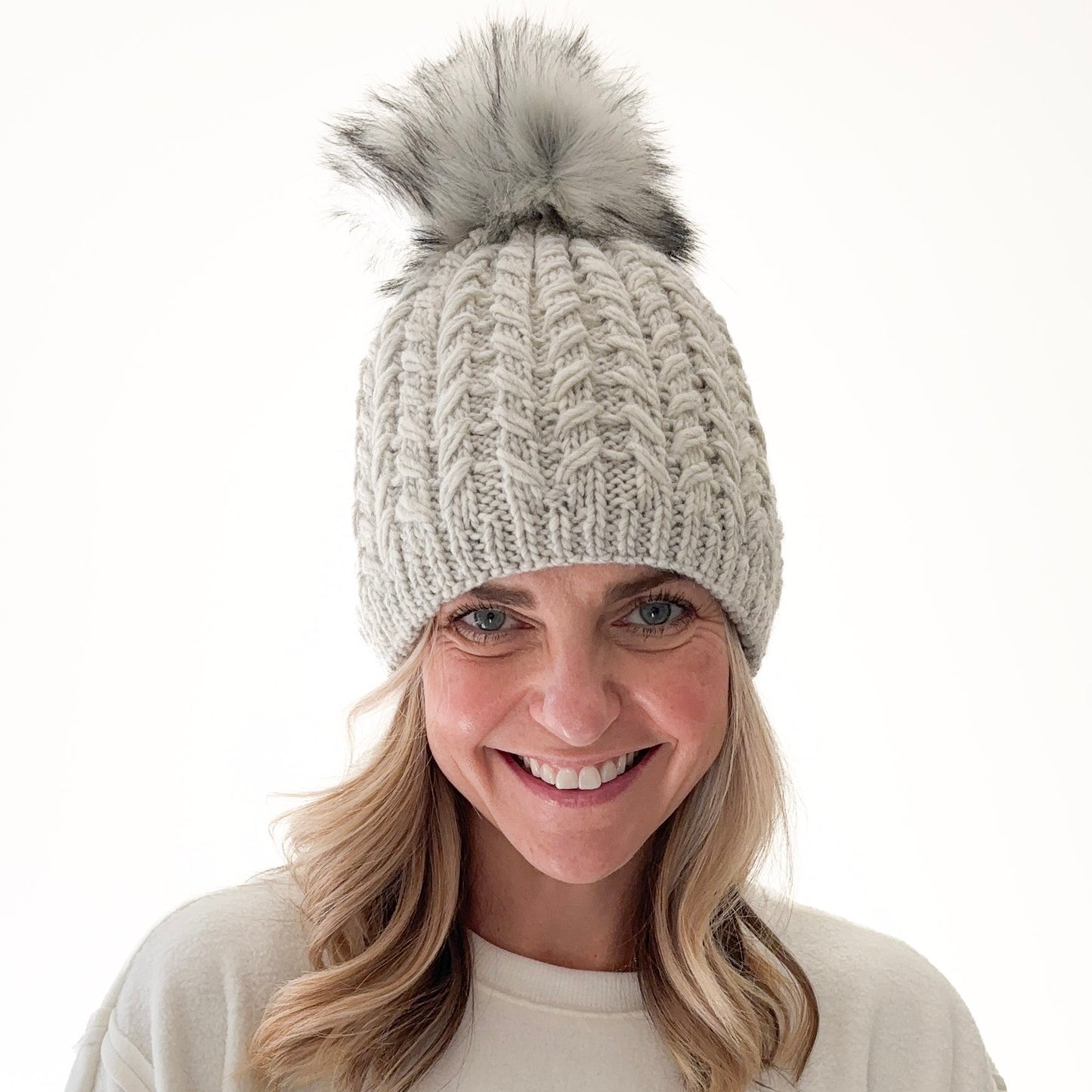 Platinum grey birdseye knit beanie with oversized ivory pom pom