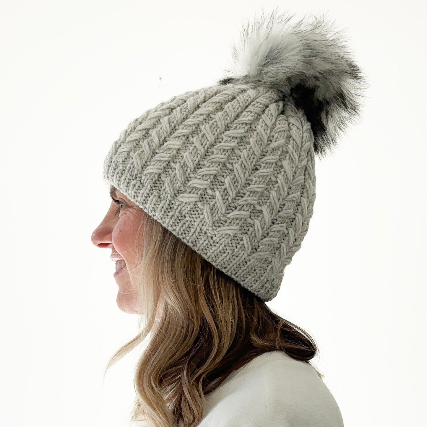 Platinum grey birdseye knit beanie with oversized ivory pom pom