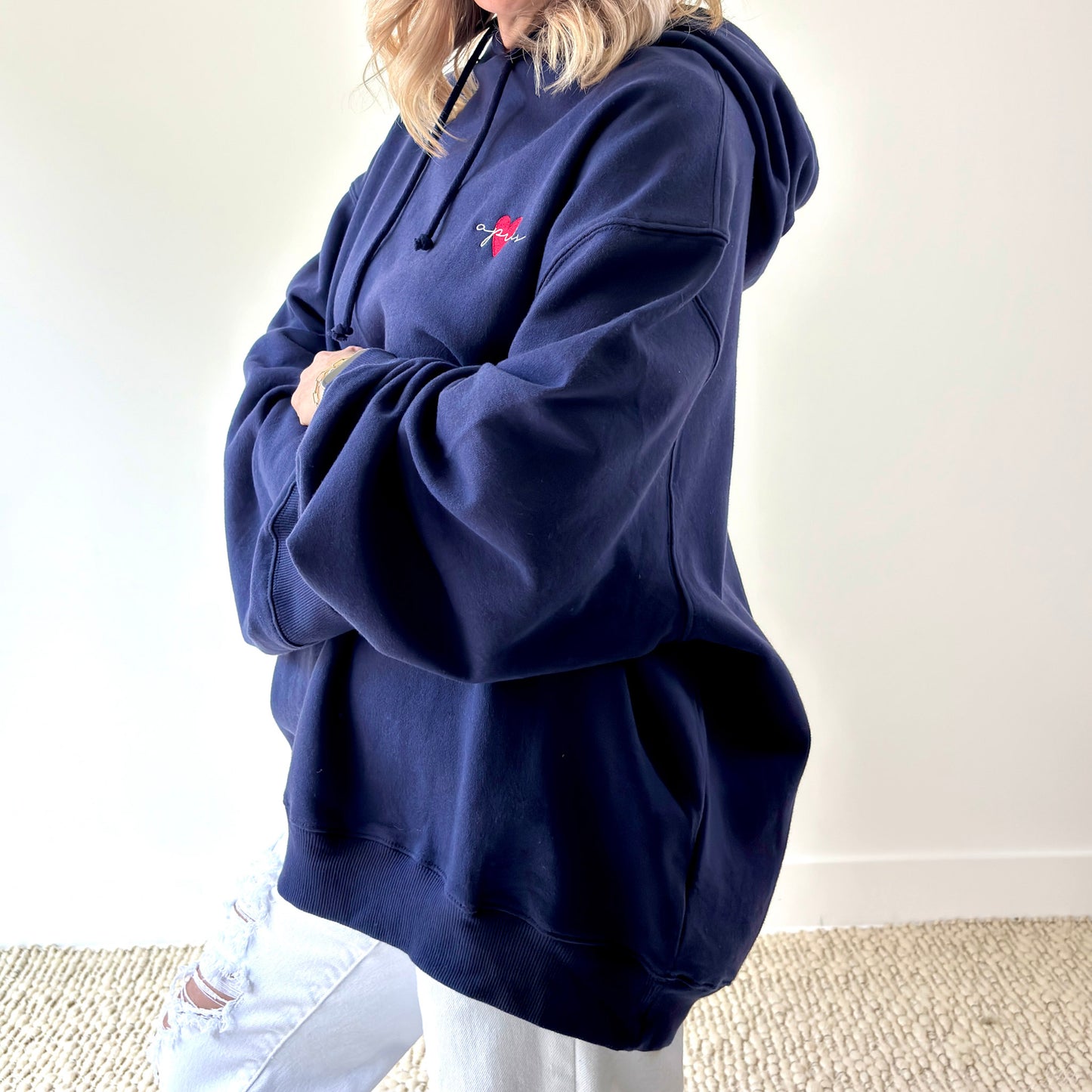 Women's navy pullover hooded oversized light weight fleece sweatshirt with script après and heart embroidery