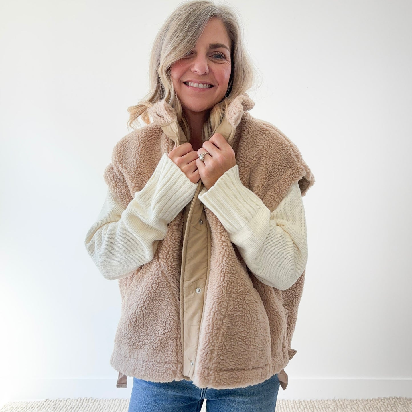 Tan fuzzy sherpa teddy fur snap front vest with pockets and twill tape side tie detail