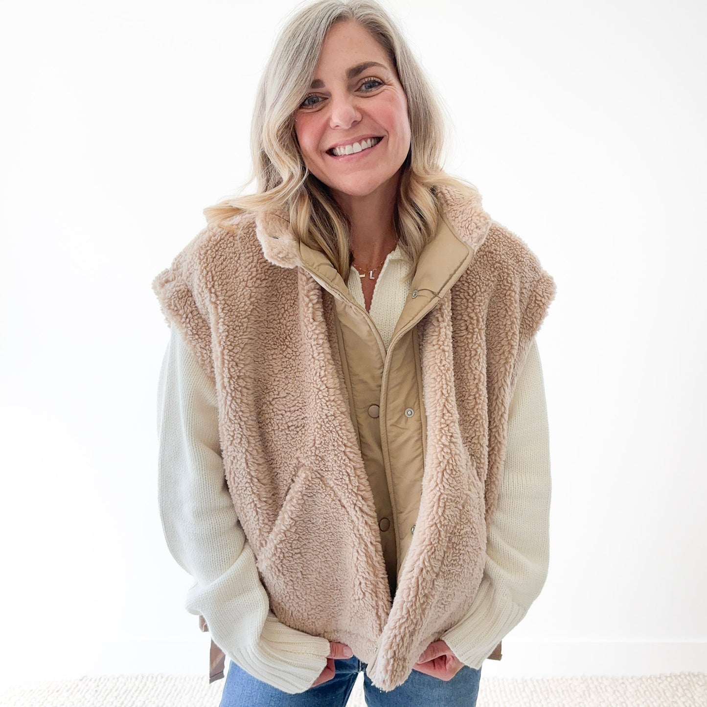 Tan fuzzy sherpa teddy fur snap front vest with pockets and twill tape side tie detail