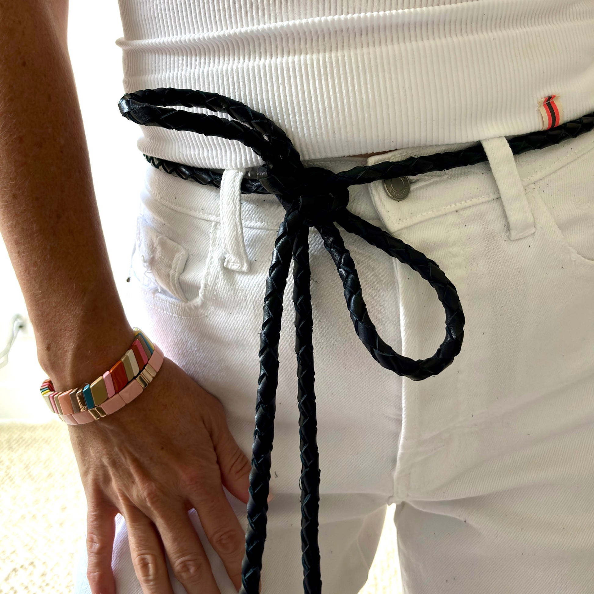 Skinny braided black leather wrap belt with tassel details