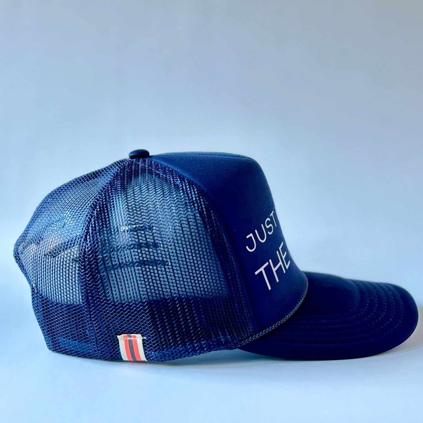 Navy Blue Mid Profile Women's Trucker Hat with Just Here for the Apres Ivory Pearl Print
