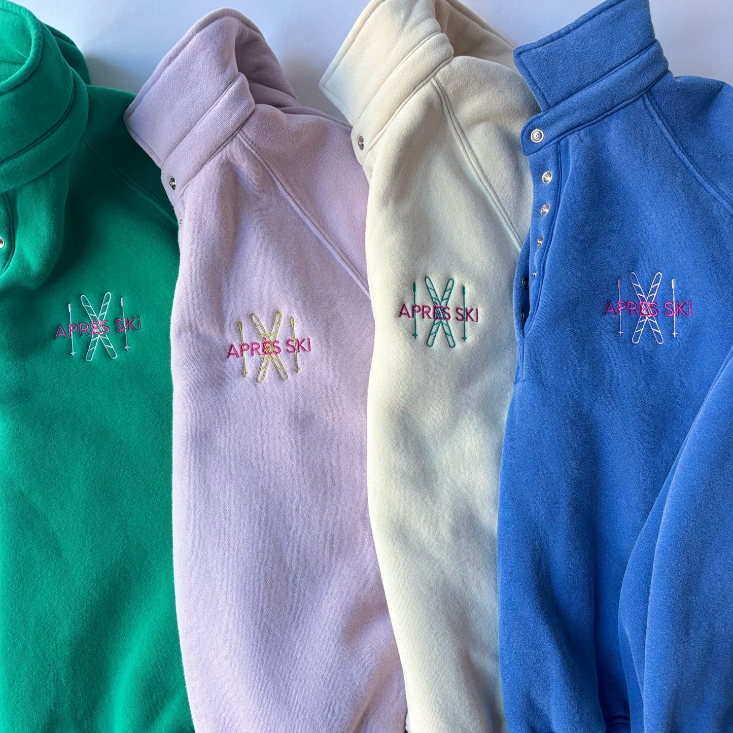 Women's super cozy fleece snap collar sweatshirt with apres ski left chest embroidery