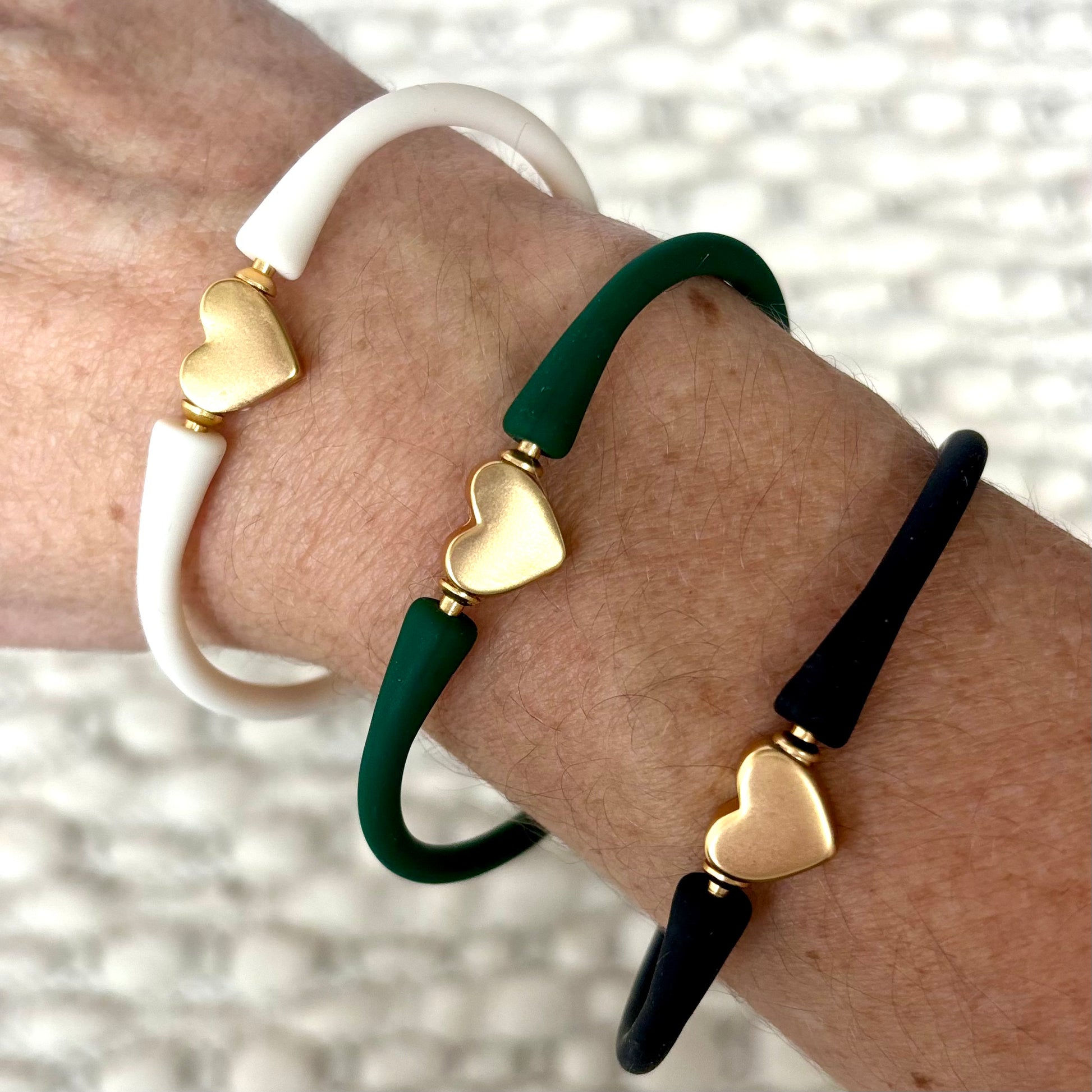 Gold heart charm with silicone band bracelet