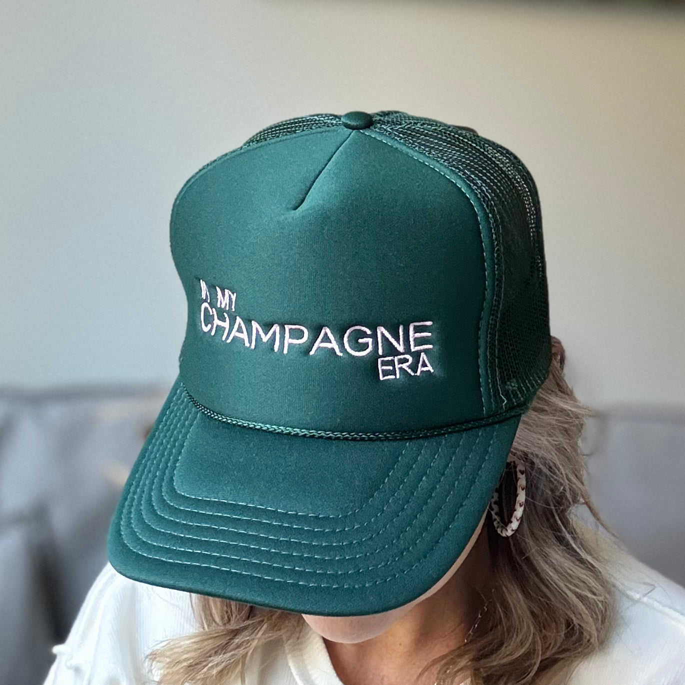 Dark green in my champagne era light pink embroidered high profile trucker hat