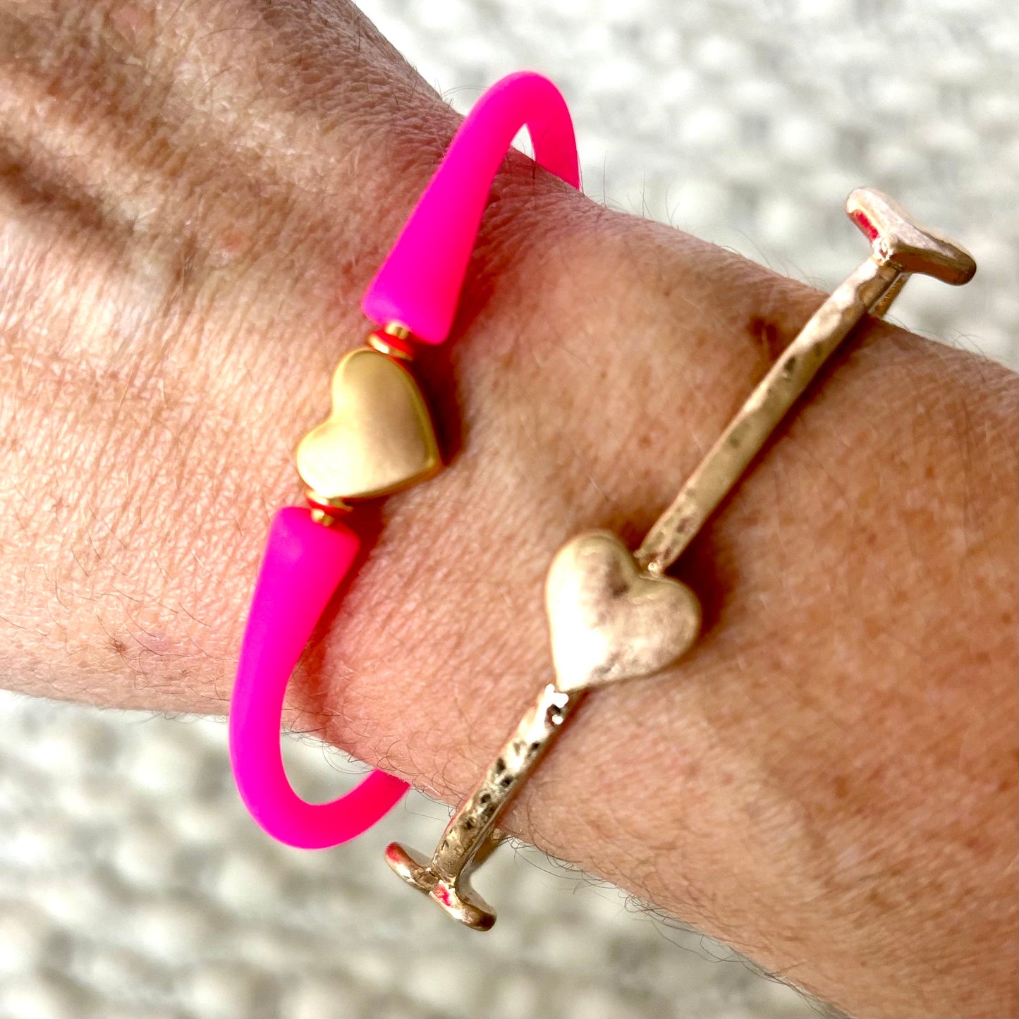 Gold heart charm with neon pink silicone band bracelet