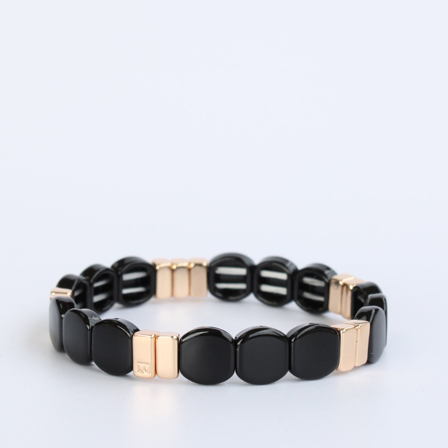 Black enamel and gold tile stretch bracelet